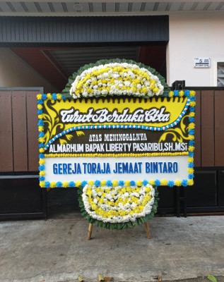 Papan Bunga Duka di Waruruma